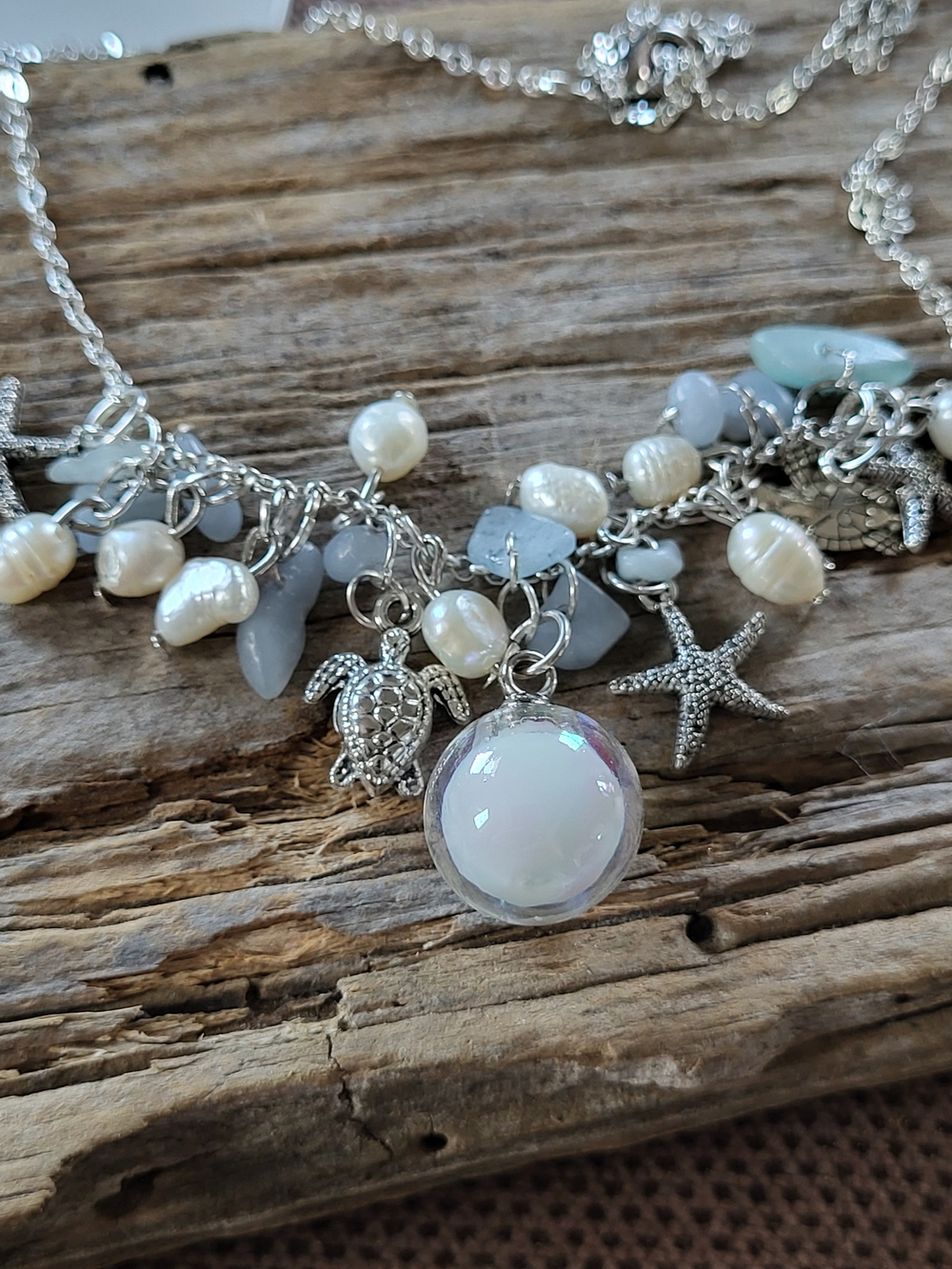 Silver Toned Sea Charm Necklace with White Pearls and Iridescent Orb